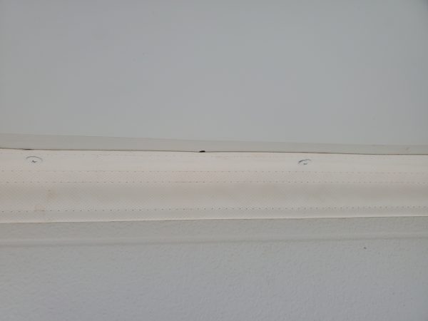 Side/TopSealer installed directly on garage door frame.