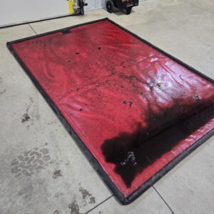 SnirtGrabber Matt holding oil spill